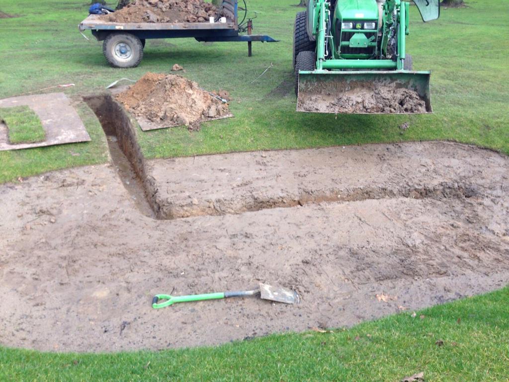West_Derby1896's tweet photo. Drains going into the 11th bunkers ready for sand... 👍 #diggingclay http://t.co/m7QvEjSkcL