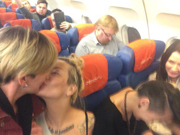 cnni's tweet image. Anti-gay Russian lawmaker isn't best pleased to be in selfie taken by lesbians as they kiss. cnn.it/1DdQI7U