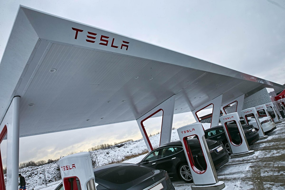 Tesla's tweet photo. Largest Supercharger Station in EU now open in Køge, Denmark. 12 Superchargers and the first with a solar canopy. http://t.co/vTgZfFmkIy