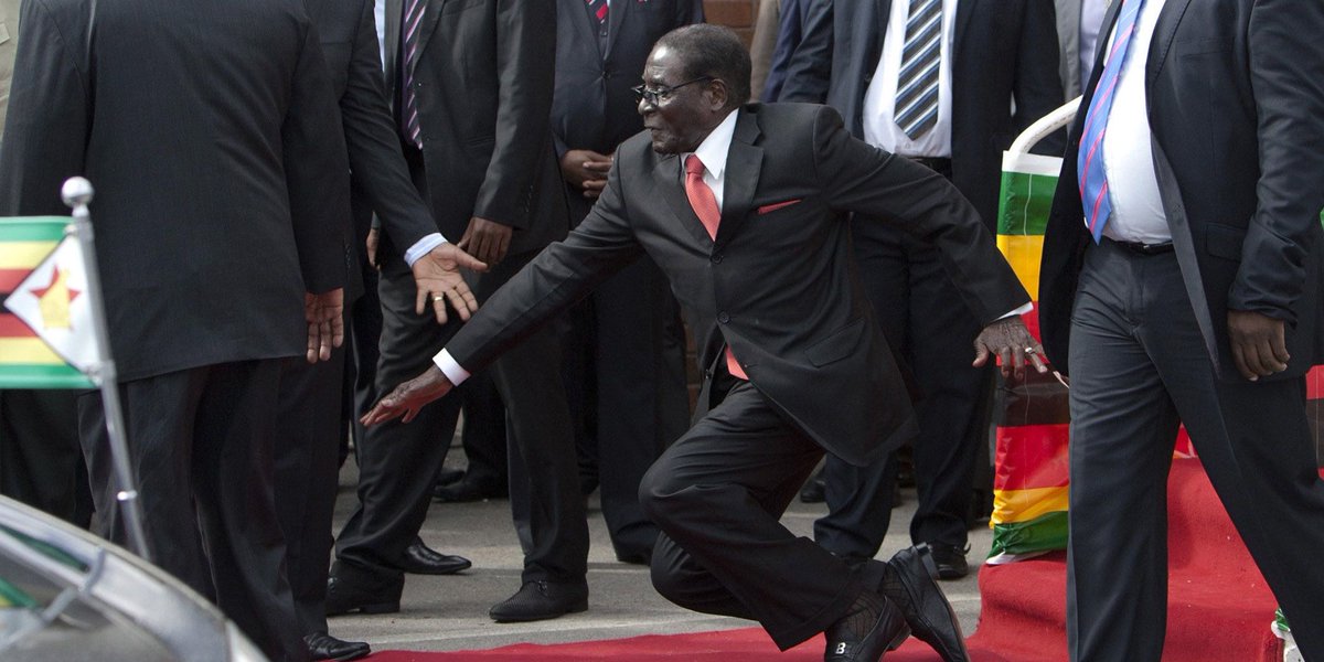 BusinessInsider's tweet image. Zimbabwe dictator Mugabe falls down steps, photographers forced to delete images read.bi/1u9CQcP