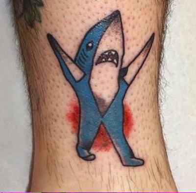 ReneeYG's tweet photo. We live in a world where someone would get left shark tattooed on them http://t.co/bUF1nDw9kJ