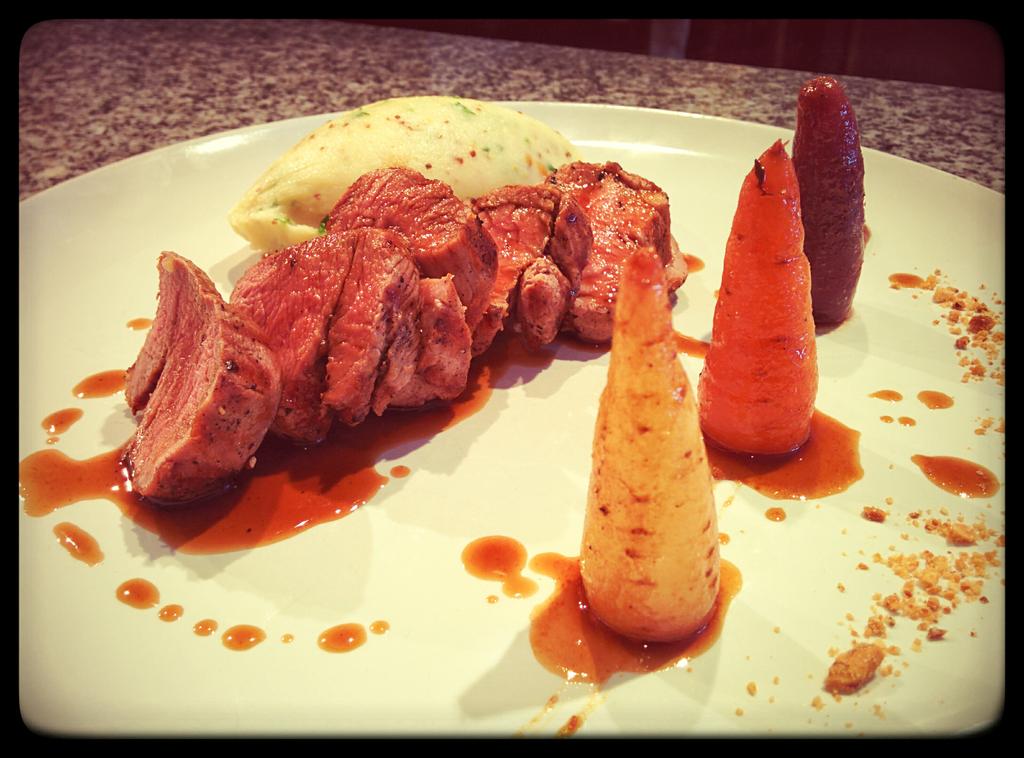 Our special today, char grilled pork fillet, mustard mash, trio of baby carrots and red wine sauce. £7.95 w/ side. X