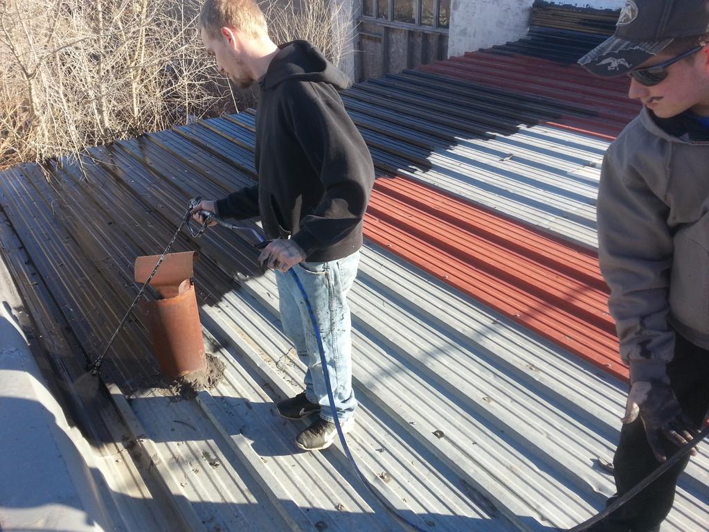 rooftite's tweet photo. Applying the waterproof protectant http://t.co/HIJ1xtBaqP