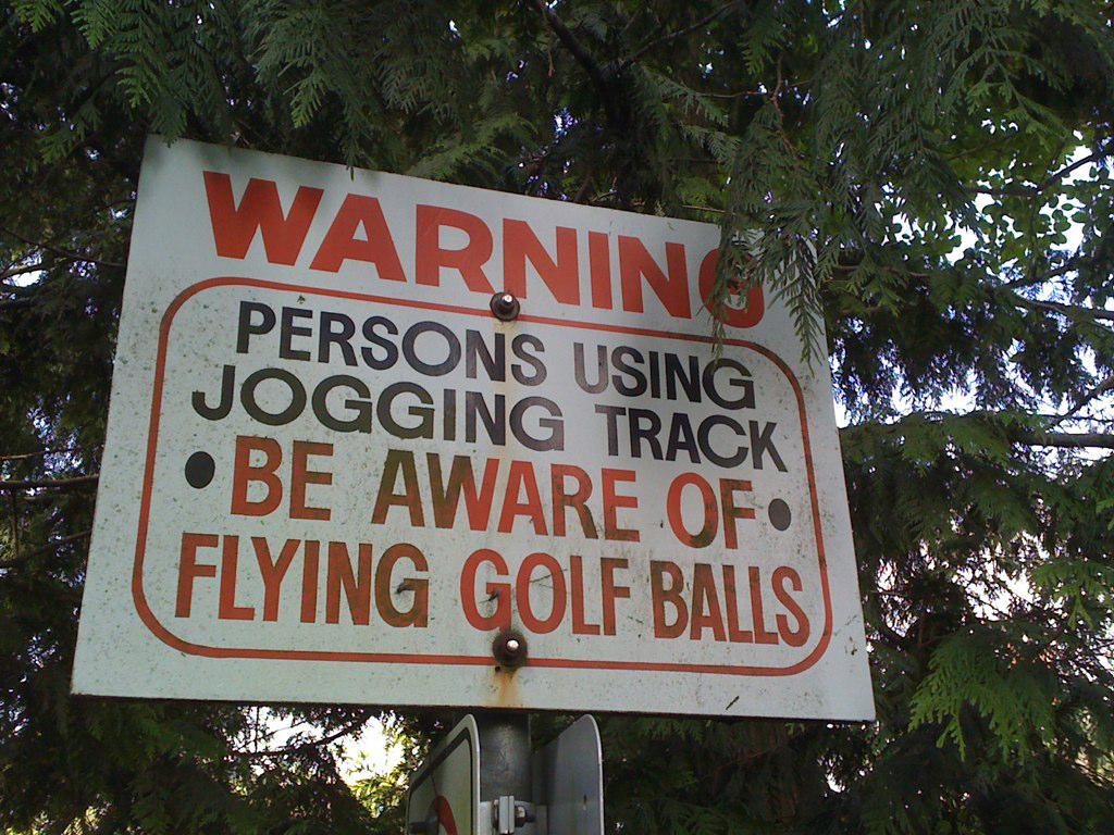 FloratineFoliar's tweet photo. Somewhere else there is a sign that reads, “Warning: Joggers shouldn’t be viewed as target practice” #GolfCourseSign http://t.co/b0FgKIJlb0
