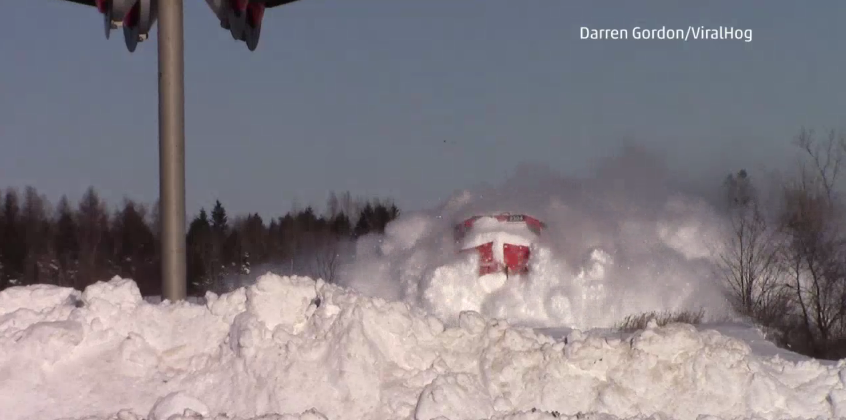 weatherchannel's tweet photo. Have you seen this yet?!  Incredible footage of a train plowing through 3 FEET of #snow! http://t.co/YCzMJ4WanR http://t.co/7Z2AnT4h3b