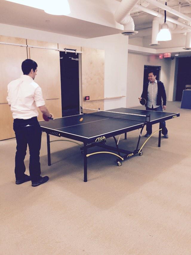 FanDuelResearch's tweet photo. High stakes @DailyMVP vs. numberFire ping-pong matchup! @TopLineGameLabs office is rocking. http://t.co/w41S8RRQp3