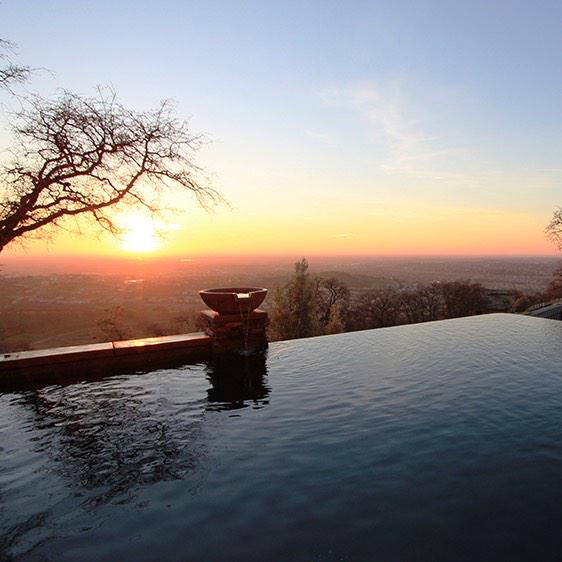 swimmingpoolcom's tweet image. Whether it's a sunset, landscaping, or accents make sure to #GoRedForWomen #NationalHeartMonth swimmingpool.com/fitness