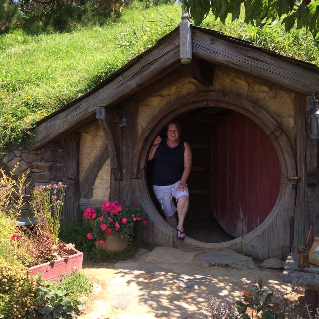 gillfountain's tweet photo. In the doorway of a hobbit house New Zealand http://t.co/FMREUVEfuM