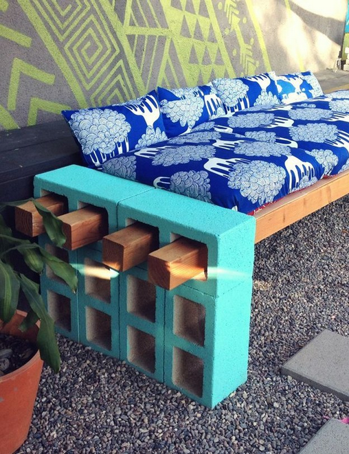 #DIYSunday Use concrete blocks and store-bought wood to create a rugged, outdoor couch!