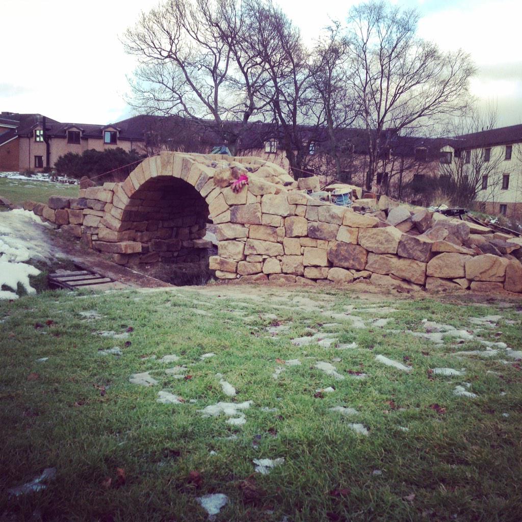 DrystaneDyker's tweet photo. It's defo starting to look rather bridgy. Another couple days building then copes go on. #golf #garden #art #craft http://t.co/HJuC47r2y8