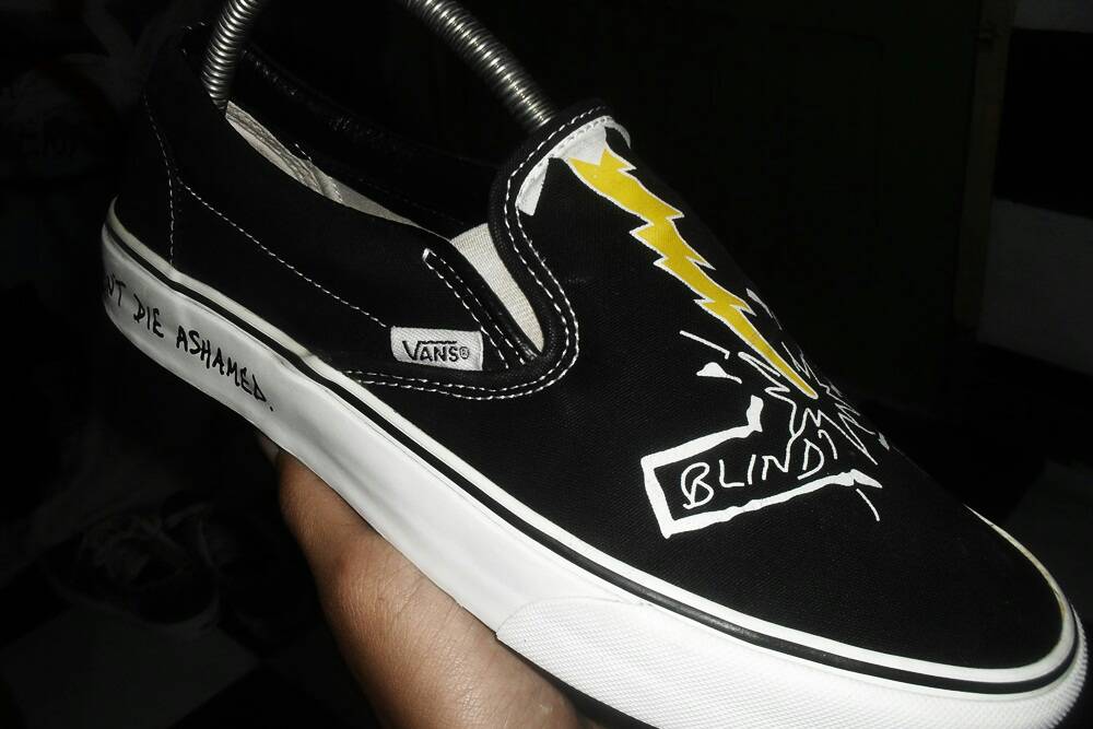 vans slip on motorhead