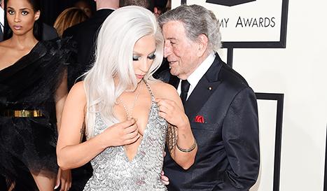 Us Weekly on X: Oops! Lady Gaga had a nip slip on the #GRAMMYs red carpet:    / X