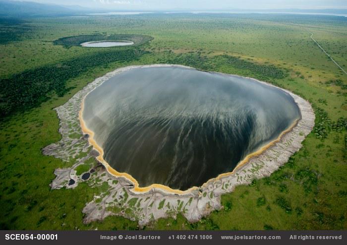 EarthPiix's tweet image. Explosion Craters, Uganda by Joel Sartore