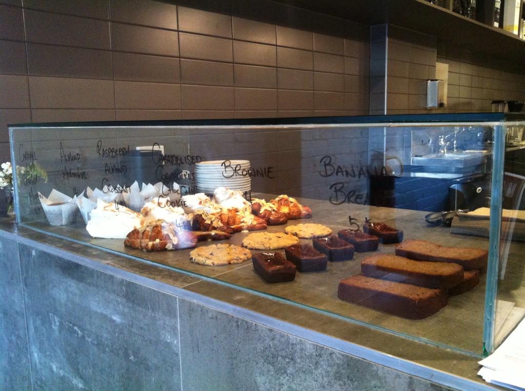 coffeeandrew's tweet photo. Everything in the cabinet made by @coffeeandrew today! #raspberryandjamcroissant #caramelisedcornflakechocchipcookie http://t.co/dK30Bufoys
