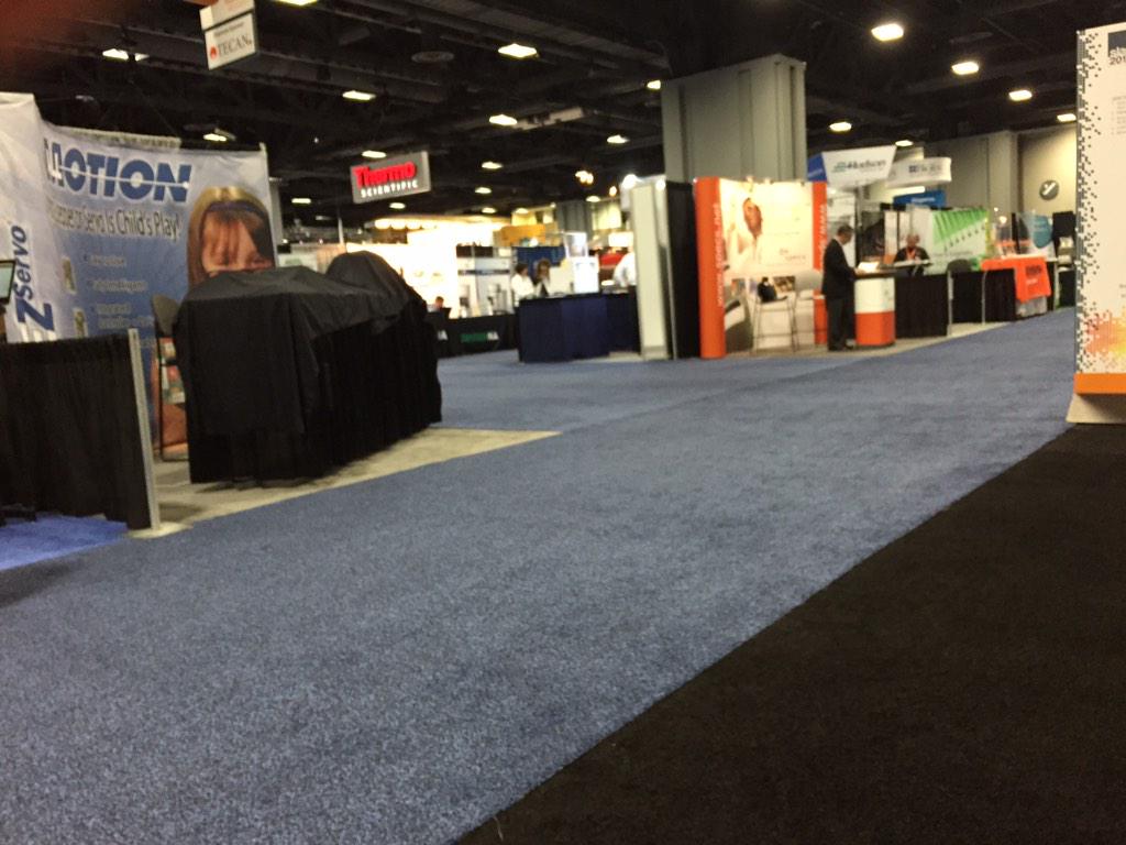 HamidGhanadan's tweet image. Ah... Nothing like the smell of fresh-laid tradeshow carpet to get the heart pumping.  At #SLAS2015