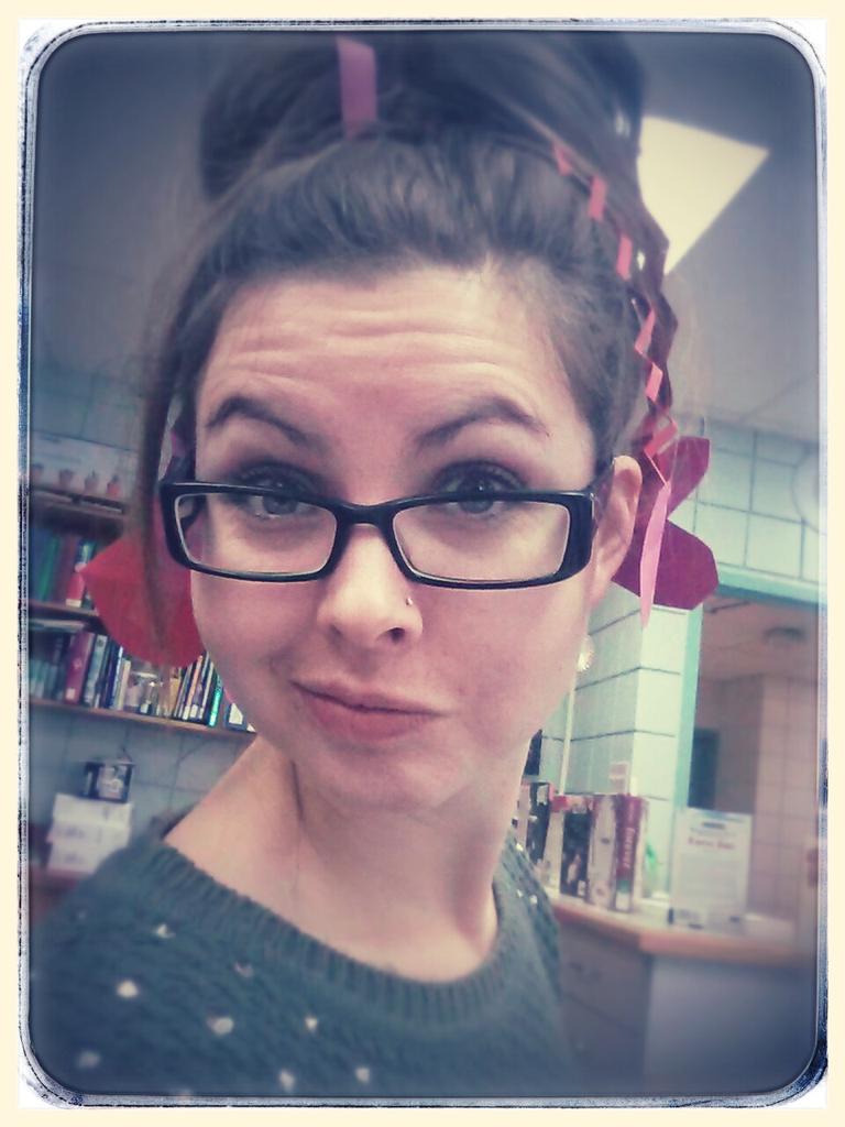 It's crazy hair day, mixed with  Valentine love! Being a school housed public library has its "perks"!  #crazyhairday