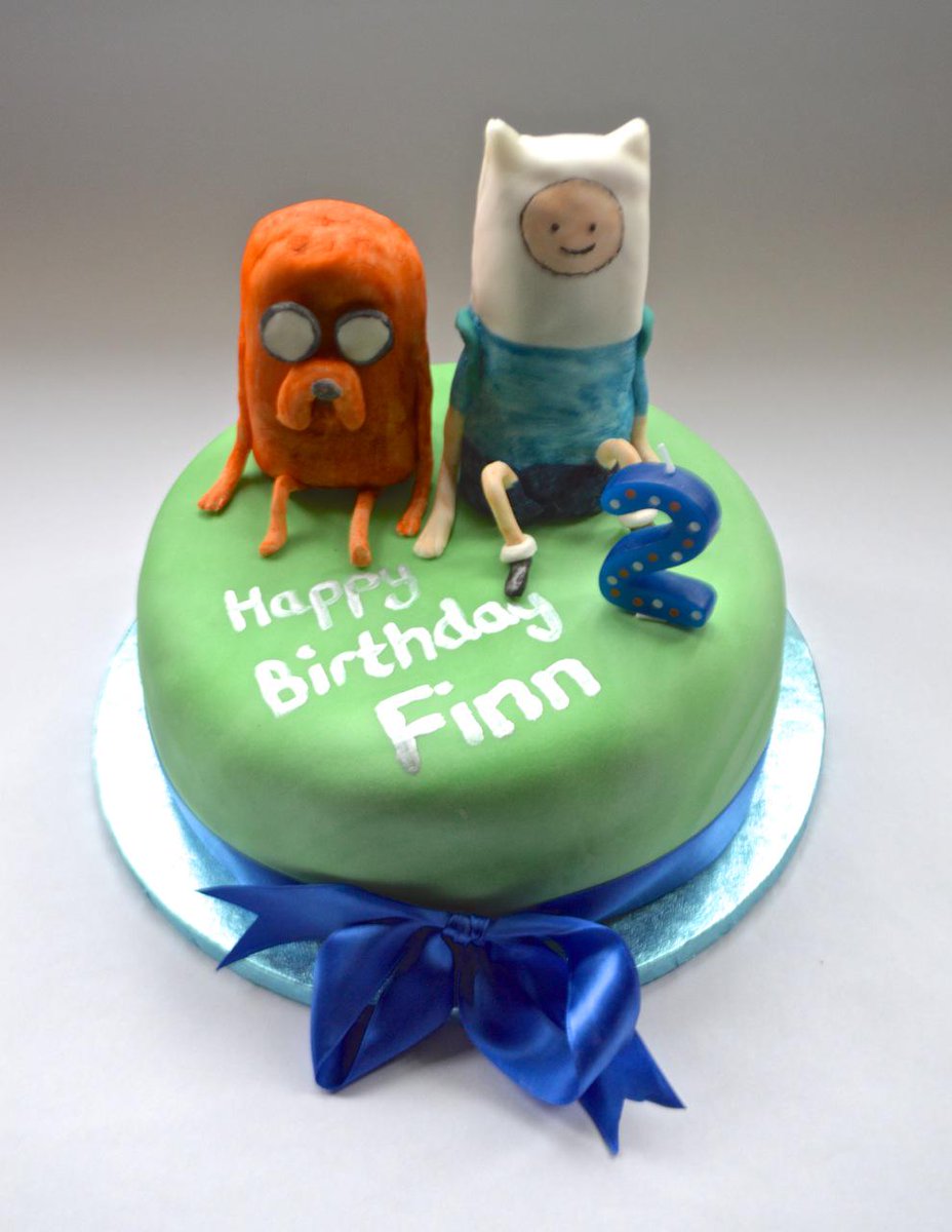 Latest bit of cake making...I made the <a href="/AdventureTime_/">Finn and Jake</a> characters from choc chip brioche rolls!