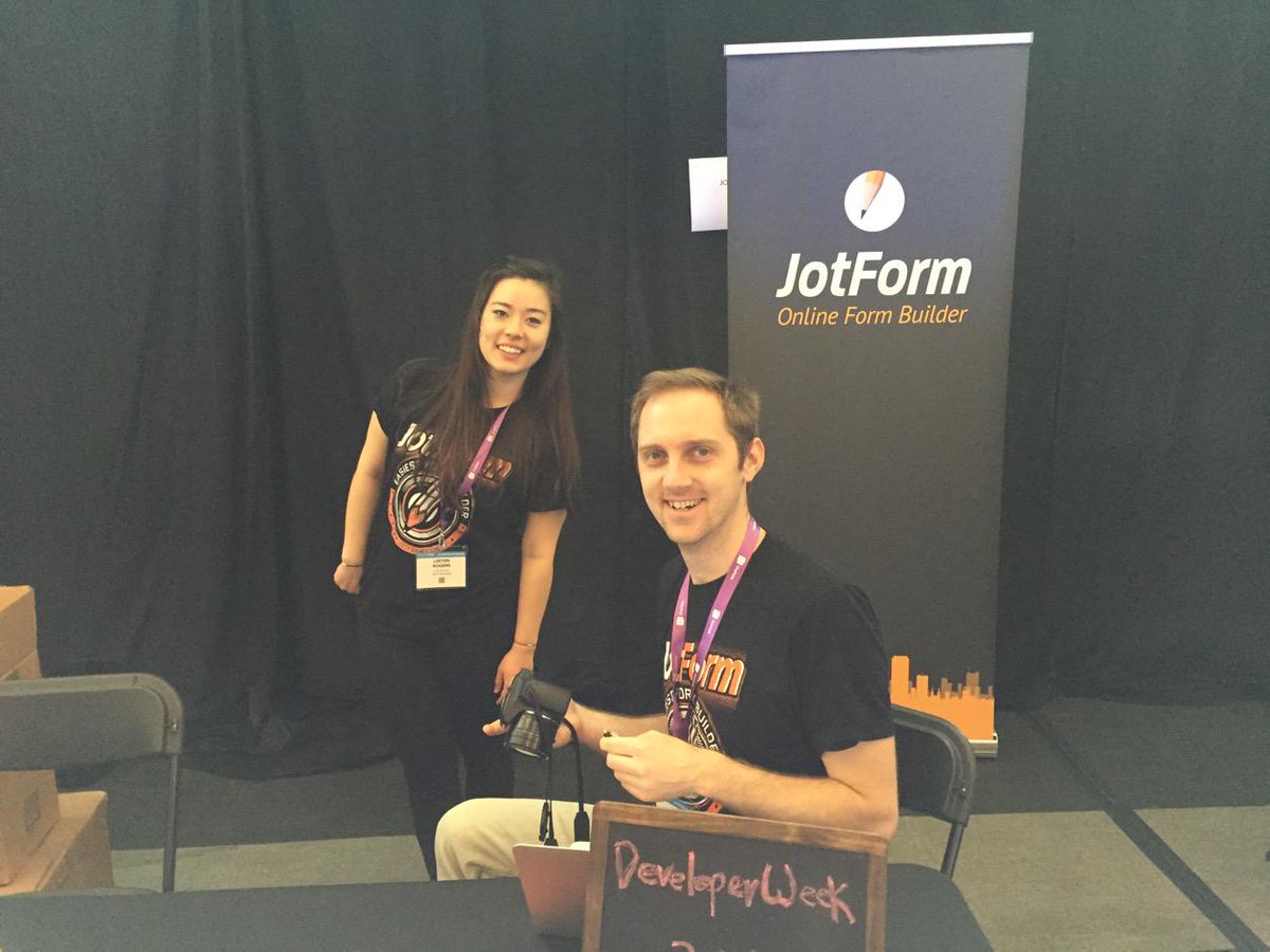 Jotform's tweet image. Leeyen and Chad of @jotform setting up at #devweek15!