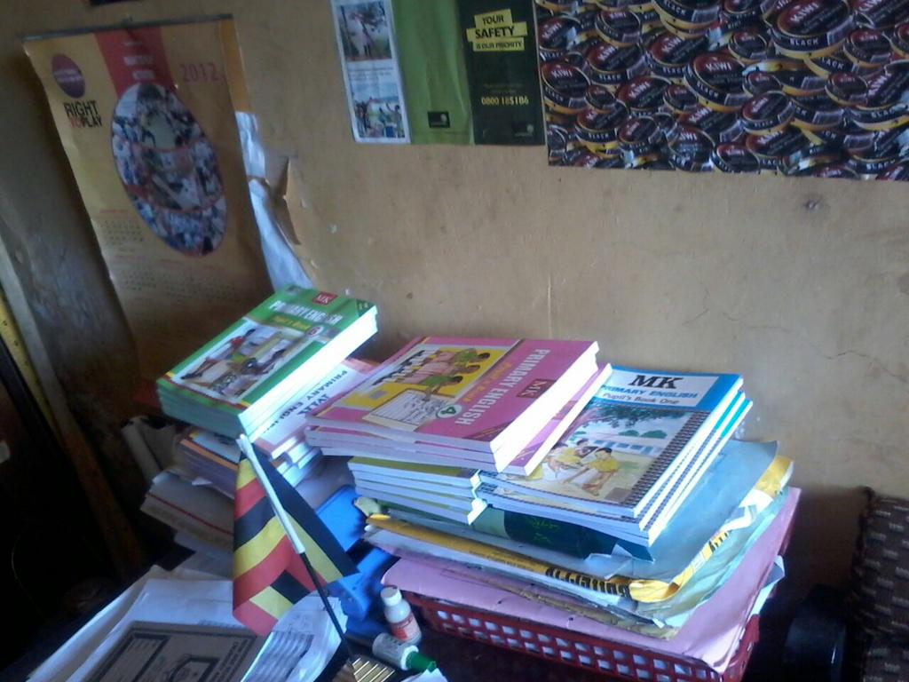 MirrorsUG's tweet photo. Because U bought a #mirrors2014 tee the headmaster said school fees won't increase - textbooks subsidize the cost http://t.co/ShTJ4jNnh6