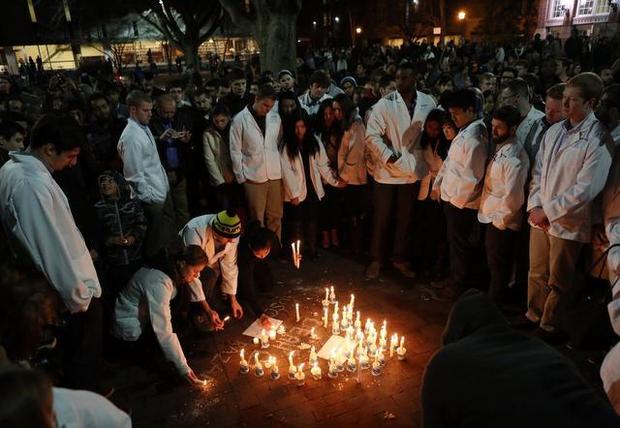 newsobserver's tweet photo. Thousands mourn shooting victims at UNC-Chapel Hill http://t.co/bNPXIWsXHm #ChapelHillShooting http://t.co/OgoDsPwIWi