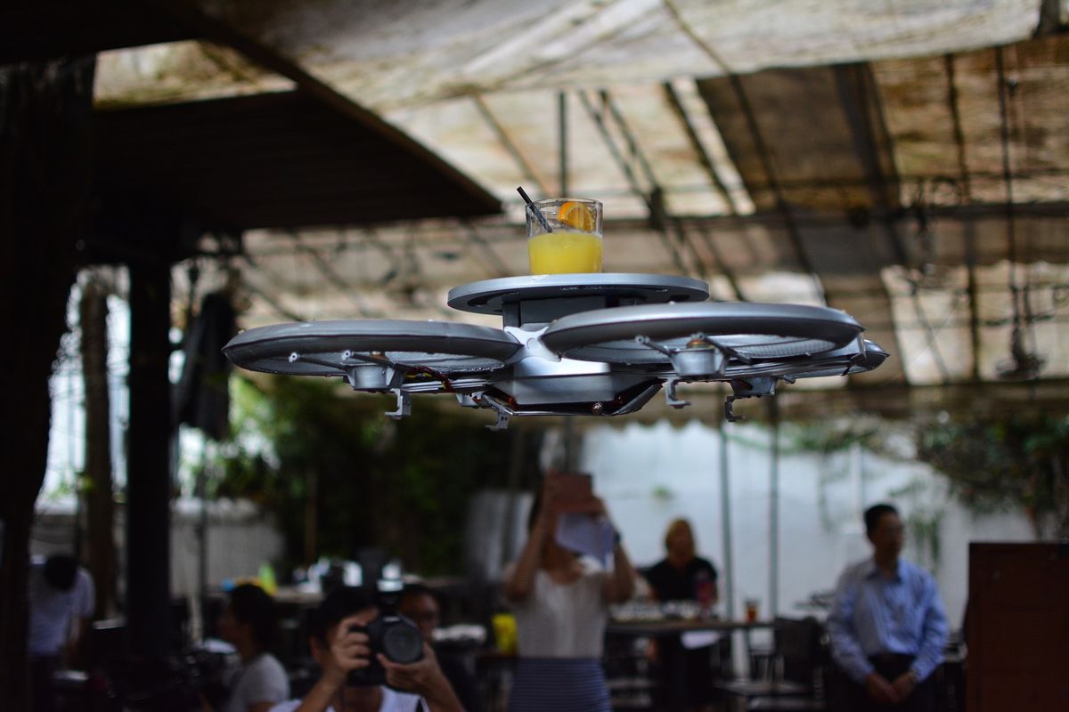 business's tweet photo. With retailers deploying drones and factories using robots, can restaurants be far behind? http://t.co/5uEtRSD5tk http://t.co/P6IZZz8qWP