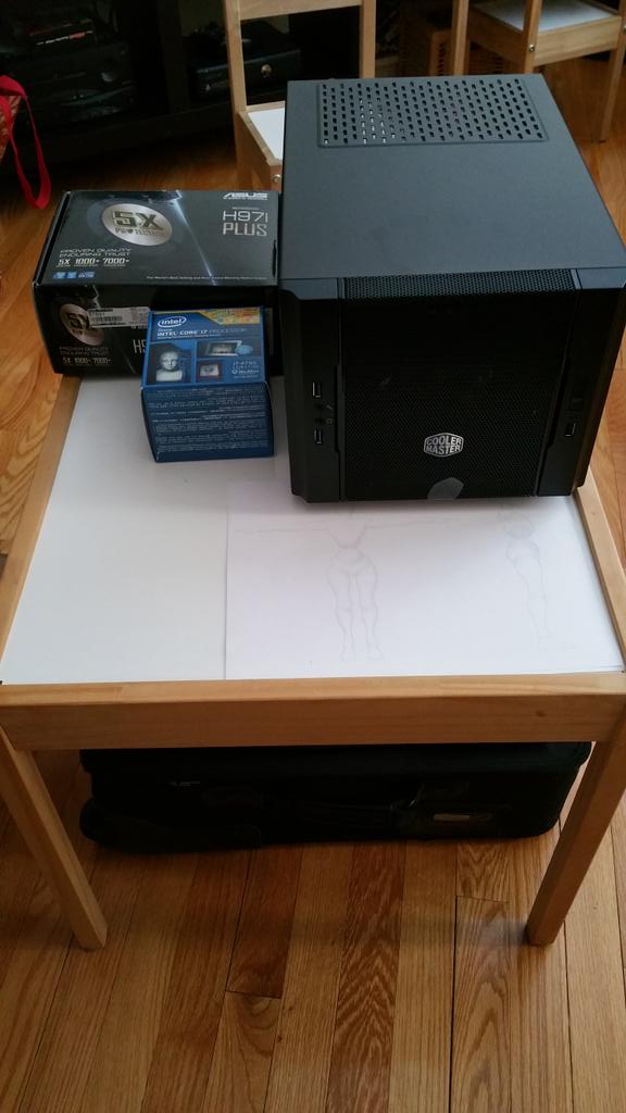 NeonJackGame's tweet photo. Yay! Parts arrived for my #GDC15  #neonjack demo machine. Mini ITX case fits in carry on luggage. http://t.co/nmwTHdxEr5