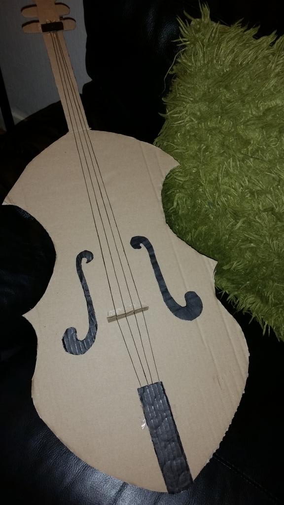 Cardboard. Not just for making boxes.....good for homework too! This is my 10year olds violin. 

#cardboard