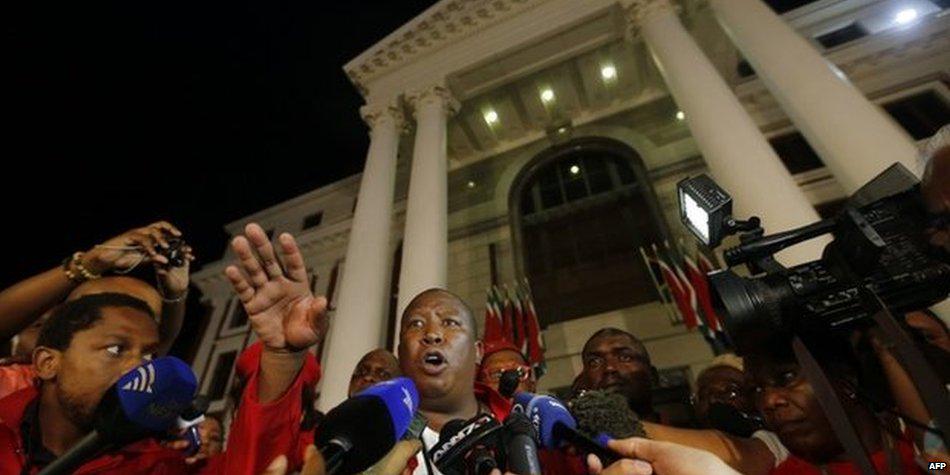BBCWorld's tweet photo. South Africa opposition leader Julius Malema removed from parliament during president's speech http://t.co/QHHhnNNj6c http://t.co/RowiTr5rFV