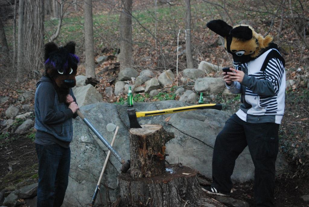 TheOneDima's tweet photo. Chopping firewood in suit for last years Xmas party.  Why?  Because we can @FangClawson #FursuitFriday http://t.co/rCB6gRrqZg