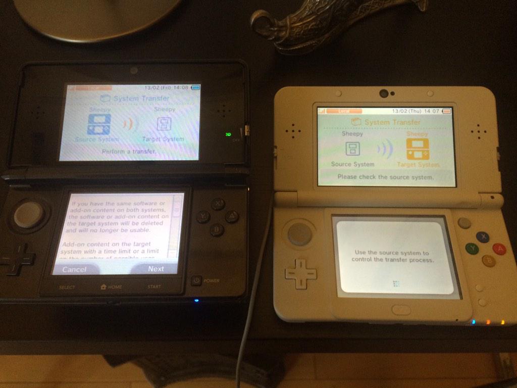 Quantum_Sheep's tweet photo. Stealing the old one's soul... :O #new3ds #old3ds #nintendo #happy3dsday #gaming #transfer http://t.co/BgnvfeaYhD