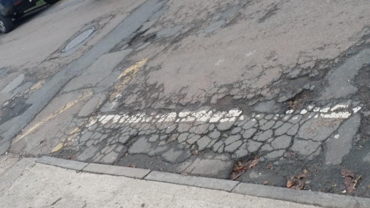 mrpotholeuk's tweet photo. #PotholeBritain is covered in #50ShadesOfGrey normally from crap repair on crap repair on OUR ROADS wasting OUR TAXES http://t.co/wD0PJGpbl0