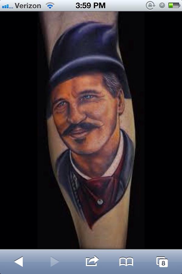 valkilmer's tweet photo. Another tattoo a friend sent me, of me. On some guys leg. Or girl. "I'll be your Huckleberry!" http://t.co/IW8RspSa