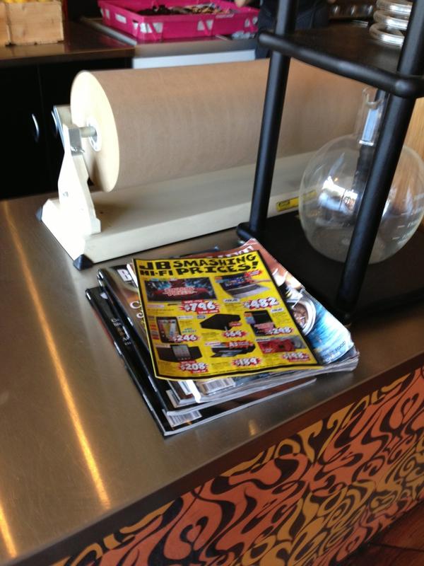 AndreiP_JBaus's tweet photo. Good thing my local coffee shop knows what's what! @JBHiFi catalogue out on top! http://t.co/yL9l2Vji