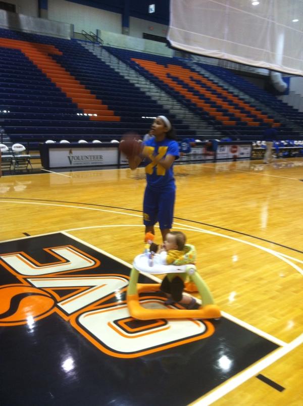 Meesh getting some shooting tips from Coop....