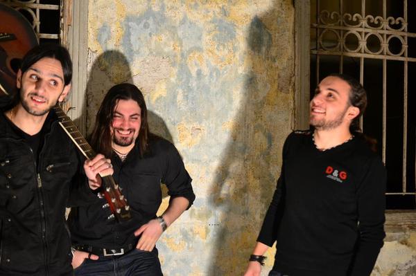 TheEEEs's tweet photo. Band members (left to right):
Elie Skaff - our former member 
Elie Apoyan - lead guitarist 
Elie El Tayyar - vocalist http://t.co/Z4B32LHw