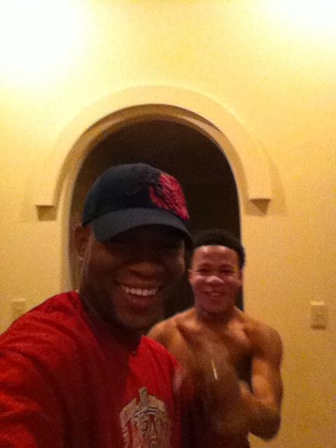 Dumor's tweet photo. One victory pic with my son in the back ground. http://t.co/9h6KKhnk