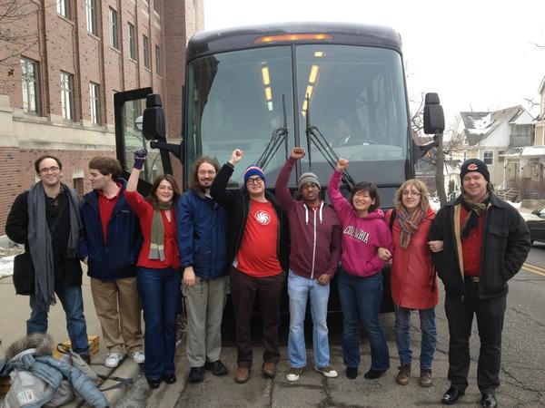 ATUDetroit's tweet photo. @IPE2013AnnArbor @IPE2013Crains Working families form a human chain to protest being thrown under the bus! http://t.co/k0G2NswM