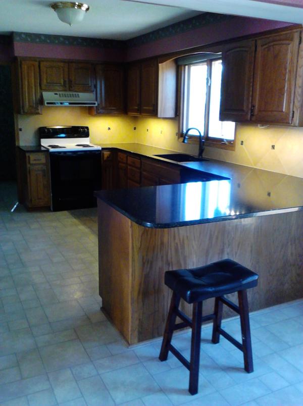 New quartz tops and backsplash.