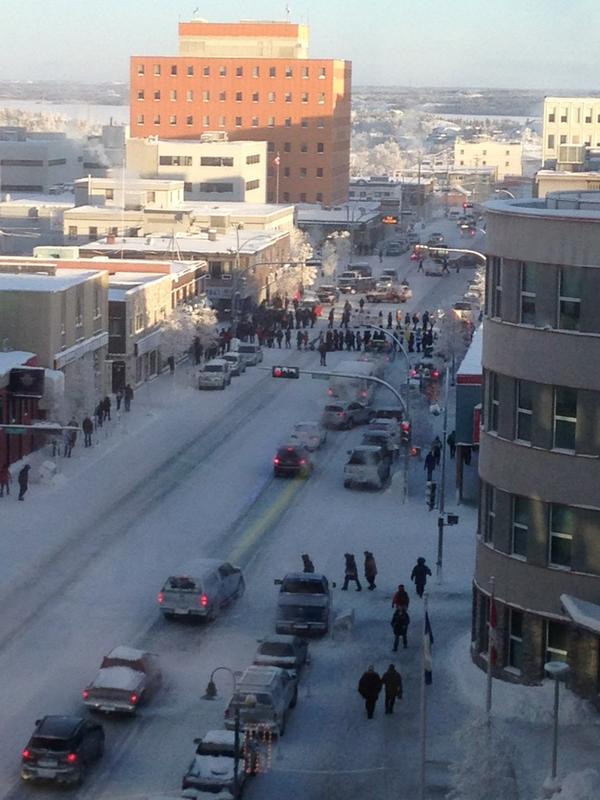 CityofYK's tweet photo. 50th and 50th - #IdleNoMore round dance in downtown #Yellowknife http://t.co/fkVKyPFg