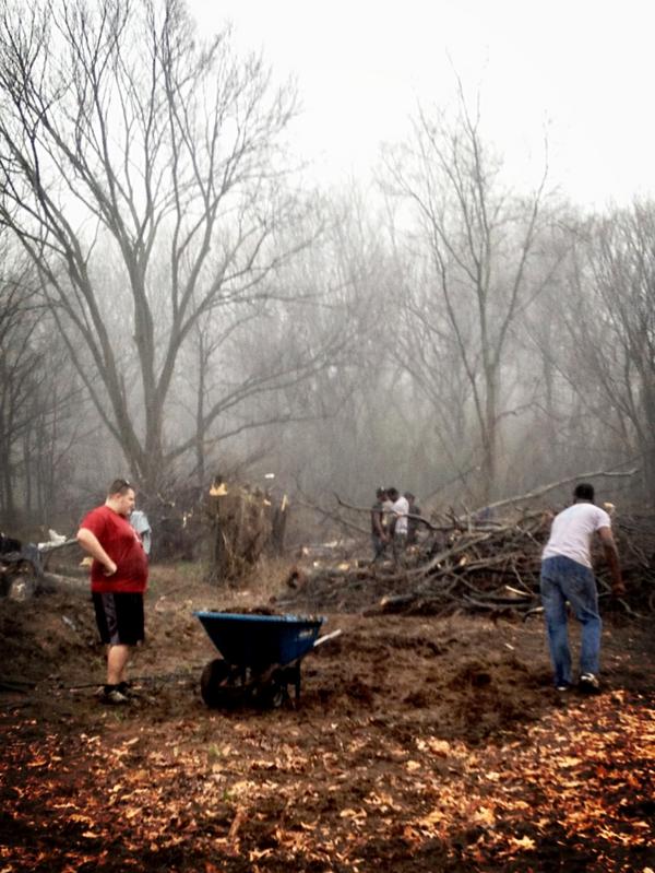 RealEricAdamcik's tweet photo. @RhodesBonner Treston Norphlet and @T_Gardiner55 shoveling mulch in the rain. #mlkdayofservice #nutbushgarden http://t.co/TgOJ4hM8