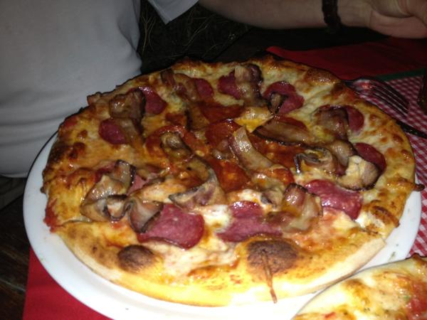 Paul's deem pizza - bacon, sausage, and salami at Tiramisu in Santiago,Chile.