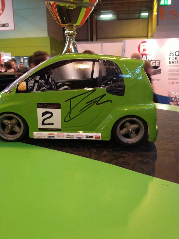smarts4you's tweet photo. First person to come to our stand and tell us who signed #littleearl wins a s4r cap @CorbeauSeatsUK @BTMotorsport http://t.co/YF2jA6PX