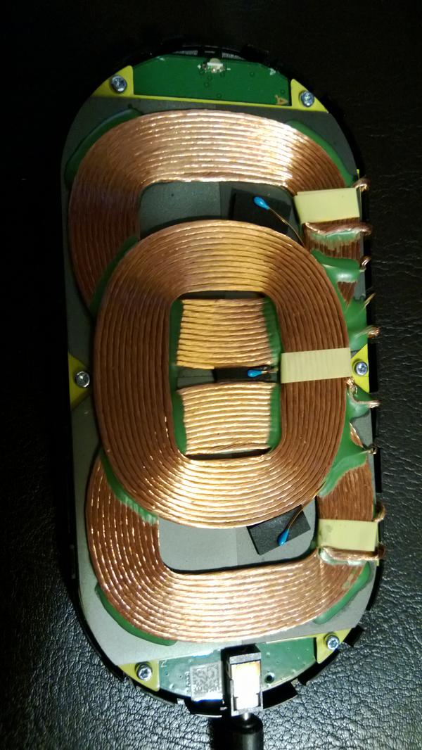 RichDunbar's tweet image. This is the inside of my #Nokia wireless charging plate. I need some magnets to make it mobile. #HackTime