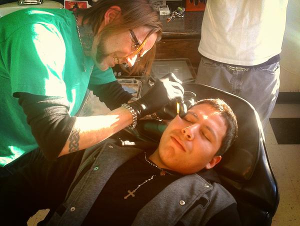 ImpactInk's tweet photo. Aj doing dermal piercing http://t.co/cvH6xTZW