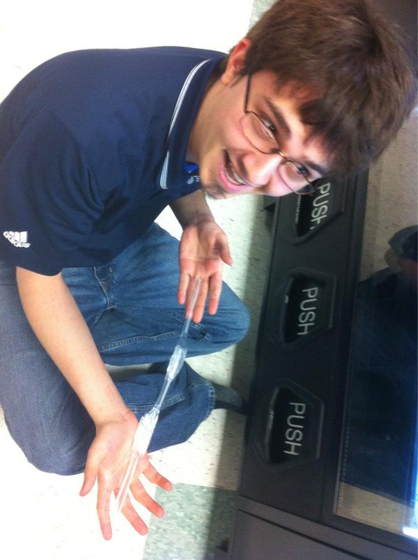 Idejder's tweet photo. The adventures of @s2kros go on. There was a drink stuck in a machine. Rob taped together utensils to try to get it! http://t.co/OAE55euN