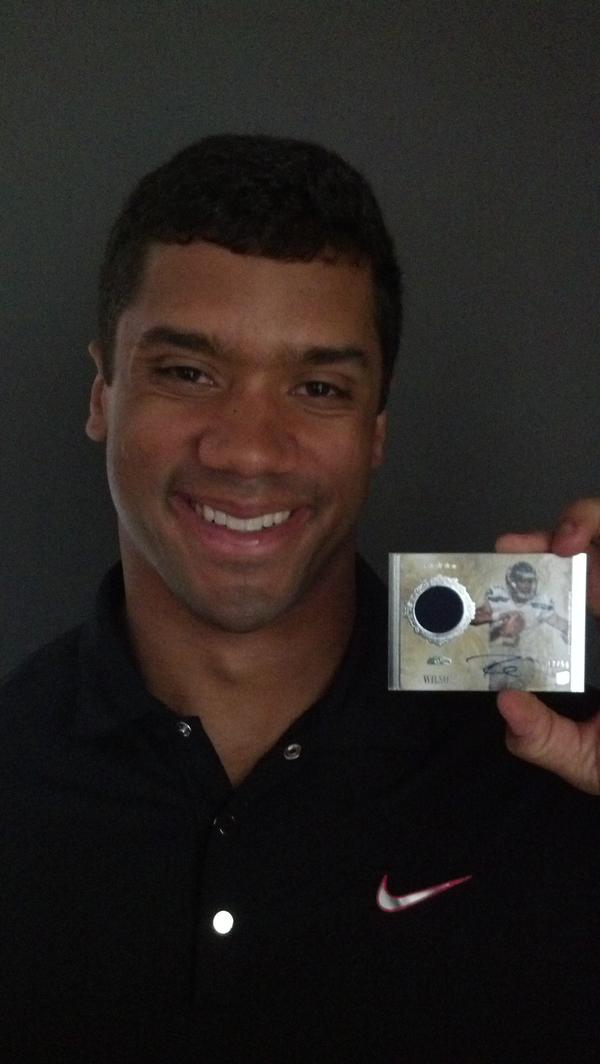 Topps's tweet image. Spent afternoon with @DangeRussWilson signing his @toppscards RT and follow for chance to win one!!