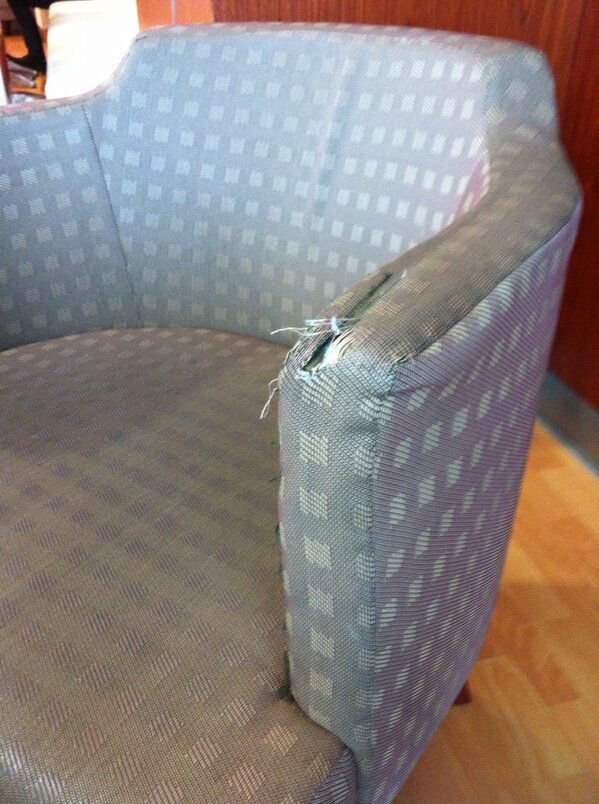 lawfm's tweet photo. Spinelli singapore serves customers with torn sofas. Not good. http://t.co/Mc033Eve