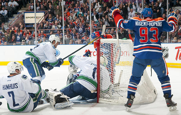 EdmontonOilers's tweet photo. Who do you think will score the first #Oilers goal of the season tonight in Vancouver?! #PreGamePoll http://t.co/7WLO7Cvx