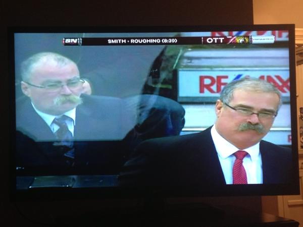 JohnWaltonPxP's tweet photo. Paul MacLean on the Ottawa bench tonight, his twin brother in the first row?!? Hilarious! http://t.co/DQG4RMKa