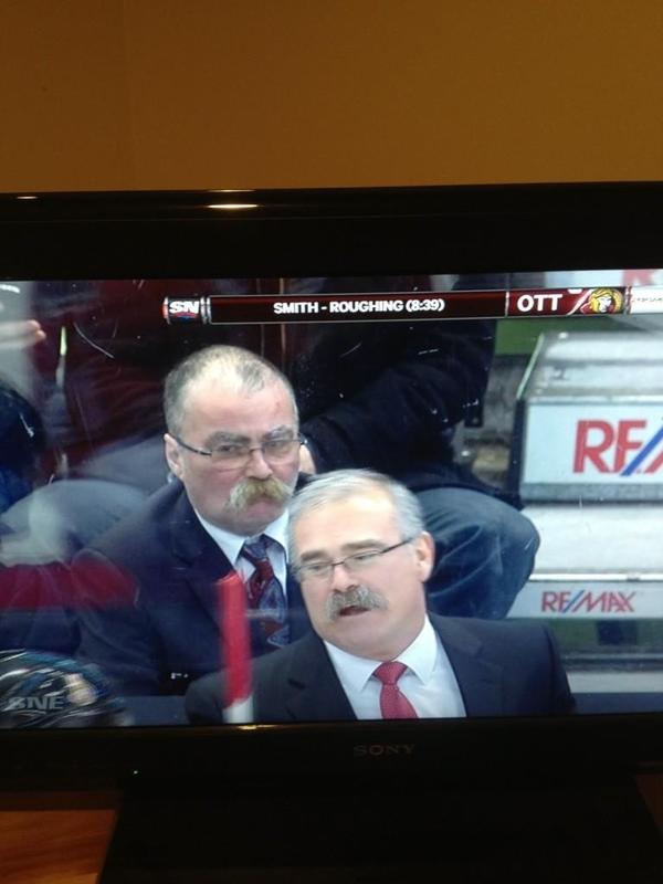 Anyone watching Sens game see the dead ringer twin for the Sens coach sitting right behind him? Check it out here